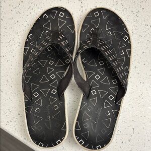 Clarks Black Sandals with Matte Finish and Geometric Patterns